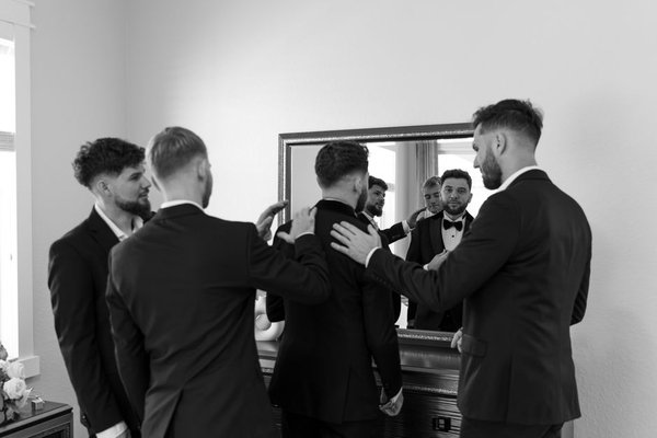 groom tuxedo vs suit wedding